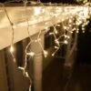 5mm Warm White Twinkle LED Icicle Lights 7 Ft. Lighted Length, 70 Lights -Xmas Lights Store 5MM LED WW twinkle Icicle Lights Roofline 6955