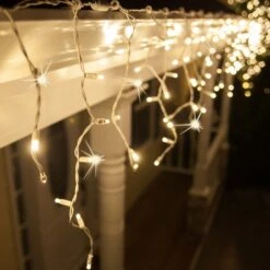 5mm Warm White Twinkle LED Icicle Lights 7 Ft. Lighted Length, 70 Lights