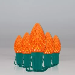 C7 Amber OptiCore Commercial LED Halloween String Lights -Xmas Lights Store C7 Faceted OptiCore LED Christmas Light Set Amber Orange Green Wire Feed