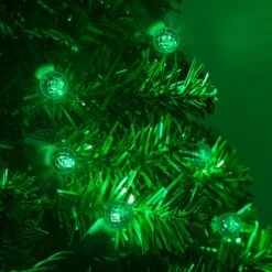 G12 Green LED String Lights 70 Lights, 24 Feet -Xmas Lights Store G12 Green LED String Lights Tree Closeup 8267